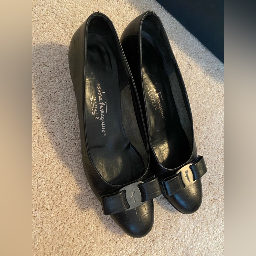 Size 7.5  Ferragamo Heels. Black with silver buckle + black bow. Gently worn.